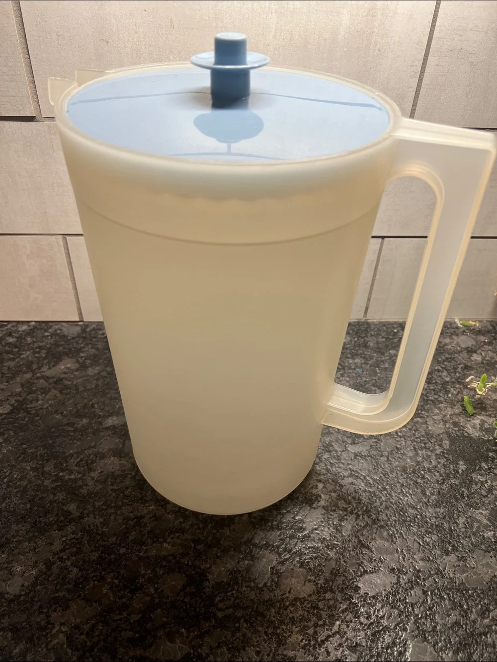 Vintage 1 Gallon Tupperware Translucent Plastic Pitcher with Light Blue Lid.